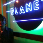 Jon at Planet sign